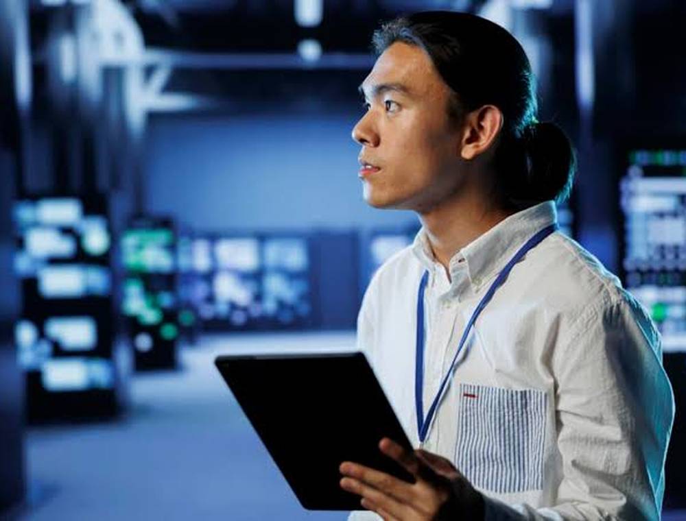 A CoreLink engineer coordinating infrastructure packages on site